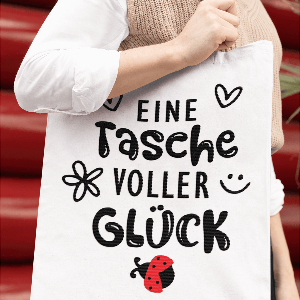 Stofftasche „Eine Tasche voller Glück“ | Wiederverwendbar KrzR DruckZone